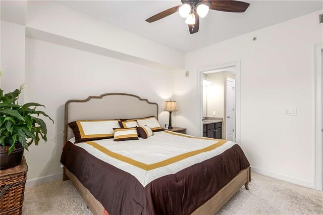 200 River Vista Dr Unit 426, Atlanta, GA 30339 - bedroom featuring a ceiling fan, ensuite bath, carpet, and baseboards