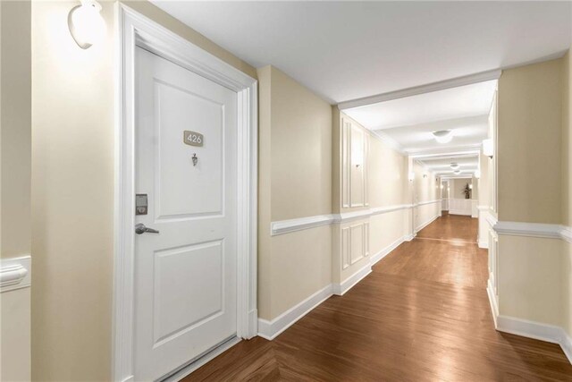 200 River Vista Dr Unit 426, Atlanta, GA 30339 - hall featuring baseboards and dark wood-style flooring