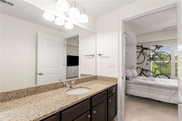 200 River Vista Dr Unit 426, Atlanta, GA 30339 - bathroom with visible vents and vanity
