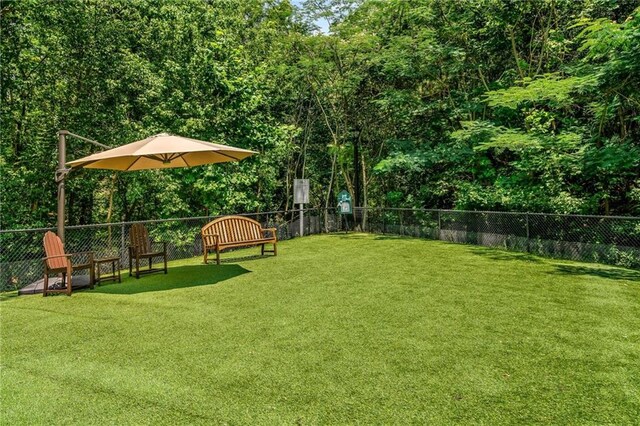 200 River Vista Dr Unit 426, Atlanta, GA 30339 - view of yard featuring fence