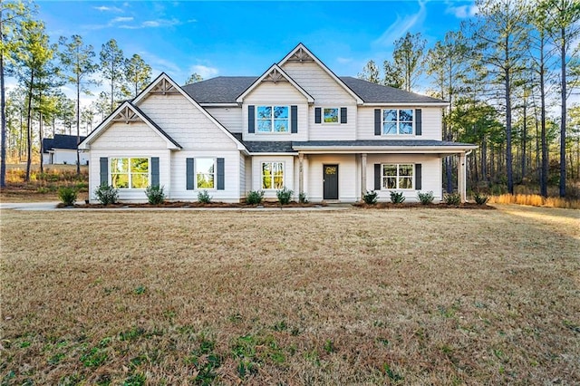 craftsman house with a front lawn