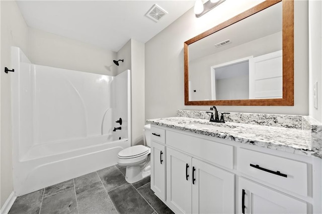 full bathroom featuring vanity, toilet, and washtub / shower combination