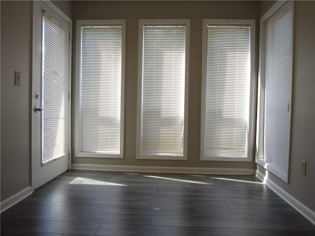 4018 Woodridge Way, Tucker, GA 30084 - spare room featuring baseboards and wood finished floors