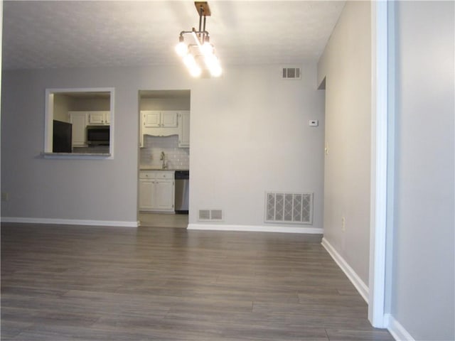 4018 Woodridge Way, Tucker, GA 30084 - interior space featuring visible vents and wood finished floors