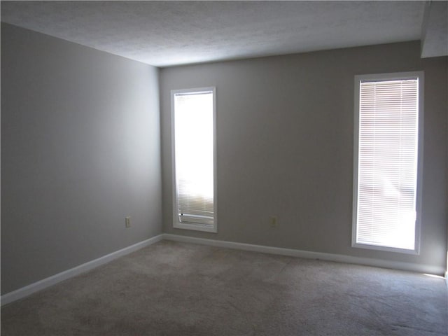 4018 Woodridge Way, Tucker, GA 30084 - empty room featuring light colored carpet and baseboards