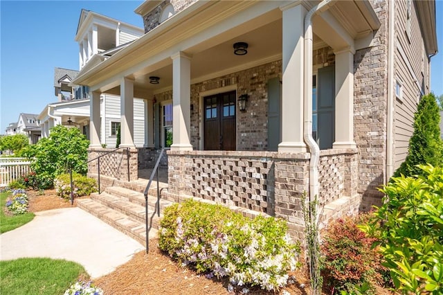 168 Brighton Blvd, Woodstock, GA 30188 - entrance to property featuring covered porch and brick siding
