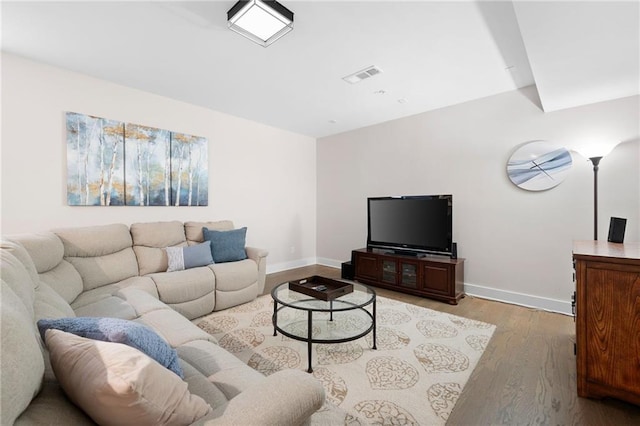 168 Brighton Blvd, Woodstock, GA 30188 - living area with light wood-style floors and baseboards
