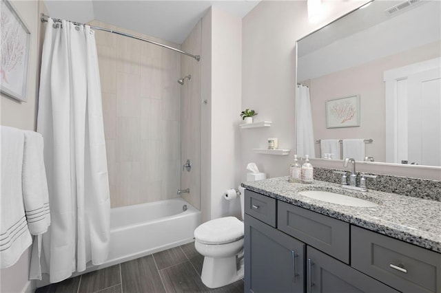 168 Brighton Blvd, Woodstock, GA 30188 - full bathroom with vanity, shower / tub combo, toilet, and wood finish floors