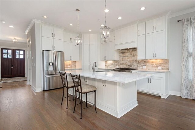 168 Brighton Blvd, Woodstock, GA 30188 - kitchen with stainless steel refrigerator with ice dispenser, a sink, dark wood finished floors, white cabinets, and recessed lighting