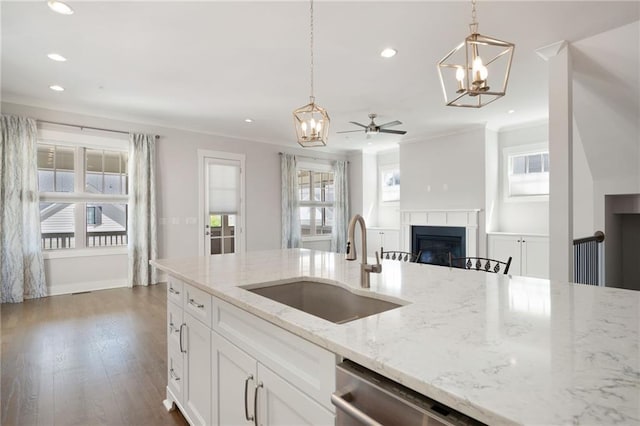 168 Brighton Blvd, Woodstock, GA 30188 - kitchen with a sink, a chandelier, a fireplace, recessed lighting, and open floor plan