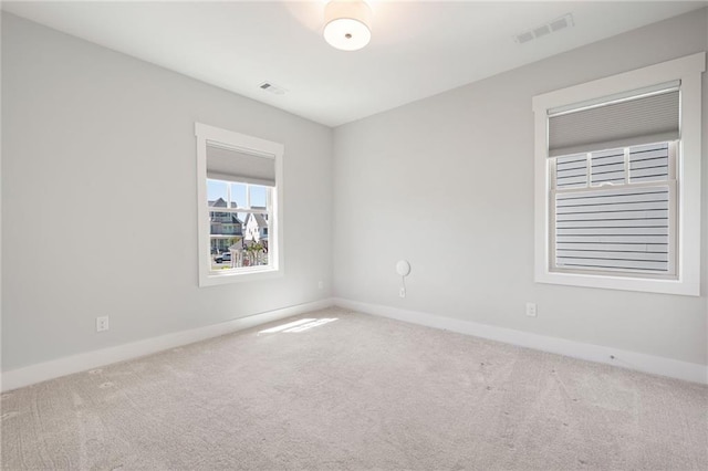 168 Brighton Blvd, Woodstock, GA 30188 - carpeted spare room featuring baseboards