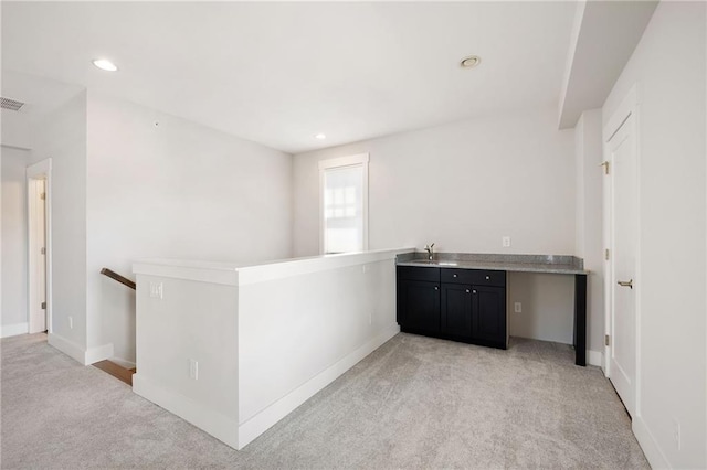 168 Brighton Blvd, Woodstock, GA 30188 - bar featuring light carpet, recessed lighting, a sink, and baseboards