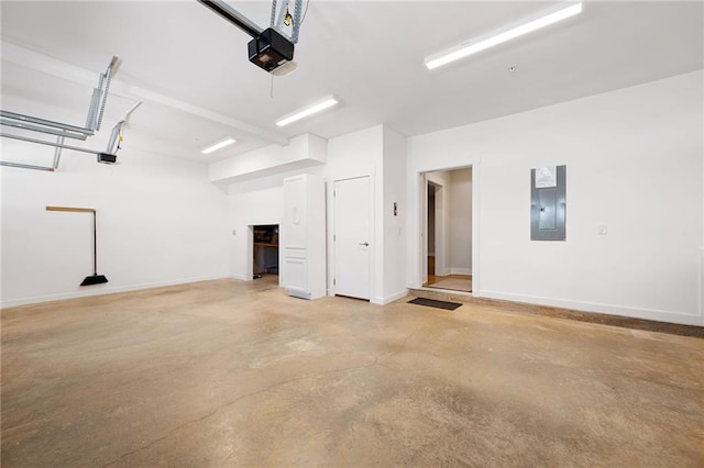 168 Brighton Blvd, Woodstock, GA 30188 - garage with electric panel, a garage door opener, and baseboards