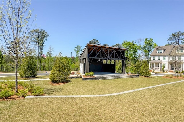 168 Brighton Blvd, Woodstock, GA 30188 - surrounding community featuring a lawn