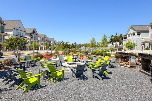 168 Brighton Blvd, Woodstock, GA 30188 - view of community featuring an outdoor fire pit and a residential view