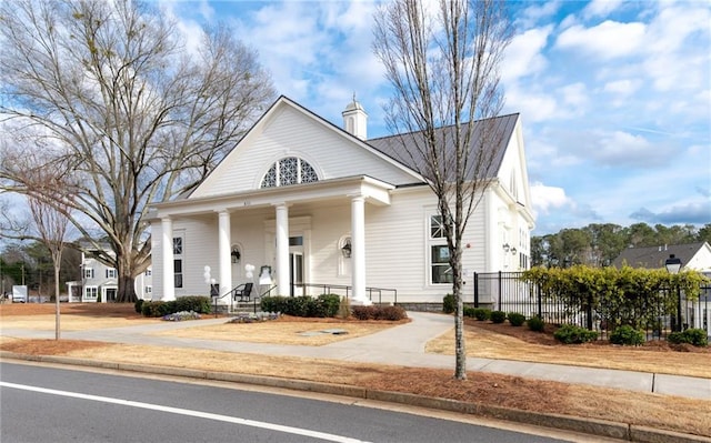 168 Brighton Blvd, Woodstock, GA 30188 - greek revival house with a chimney and covered porch