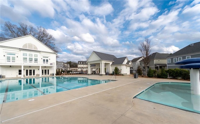 168 Brighton Blvd, Woodstock, GA 30188 - community pool featuring a patio area and a residential view