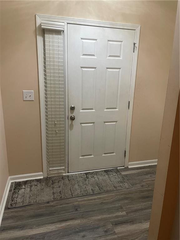 2118 Burns View Ln, Lawrenceville, GA 30044 - doorway to outside with baseboards and dark wood-type flooring