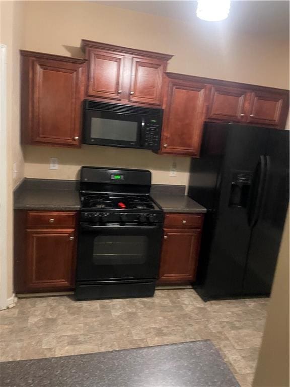 2118 Burns View Ln, Lawrenceville, GA 30044 - kitchen featuring black appliances and dark countertops