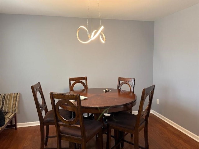 4701 Flat Shoals Rd Unit 37E, Union City, GA 30291 - dining room with dark wood-style flooring, a chandelier, and baseboards
