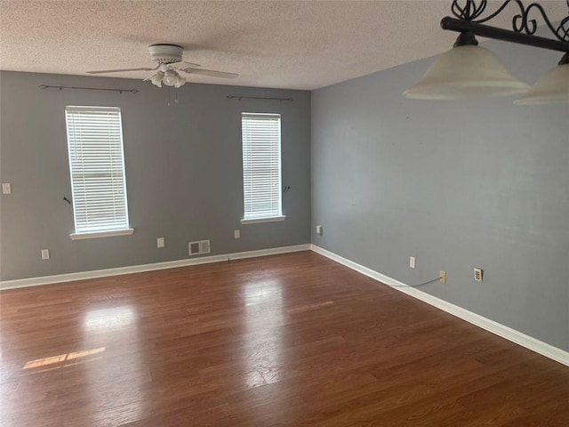 109 Westwood Dr, Dallas, GA 30132 - unfurnished room with a ceiling fan, a textured ceiling, and wood finished floors