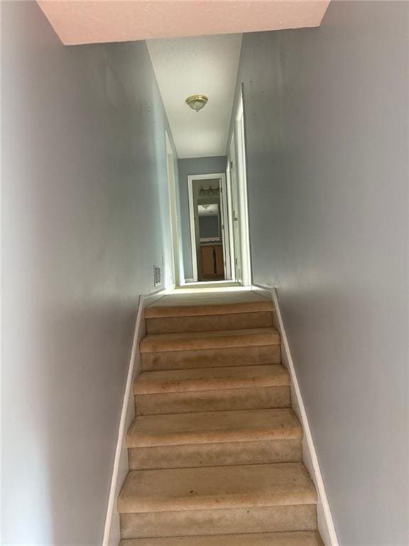 109 Westwood Dr, Dallas, GA 30132 - staircase with baseboards