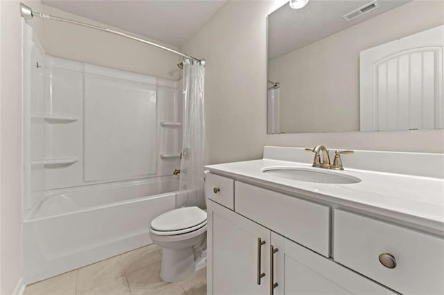 bathroom featuring visible vents, toilet, shower / tub combo with curtain, tile patterned floors, and vanity