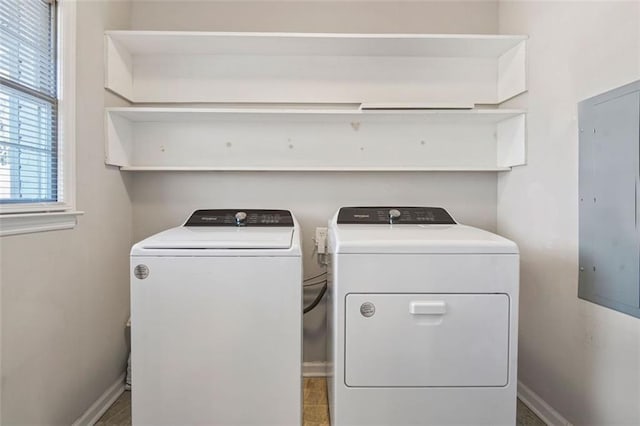 laundry room with separate washer and dryer