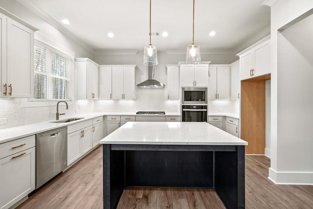 3390 Hillshire Dr, Cumming, GA 30028 - kitchen with stainless steel appliances, a sink, wall chimney range hood, a center island, and backsplash