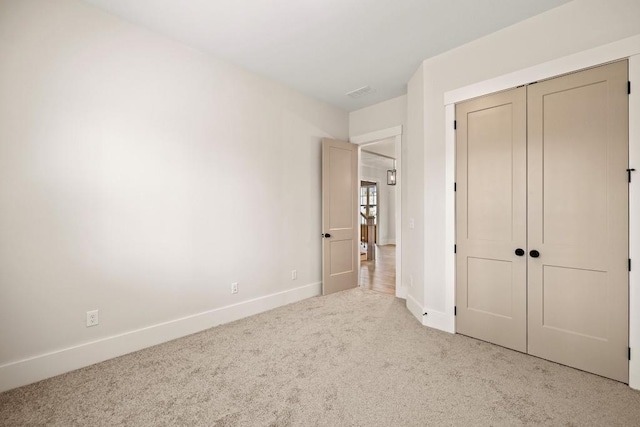 3390 Hillshire Dr, Cumming, GA 30028 - unfurnished bedroom with carpet floors, baseboards, and a closet