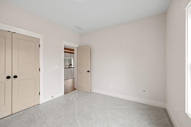 3390 Hillshire Dr, Cumming, GA 30028 - unfurnished bedroom featuring carpet, baseboards, and a closet