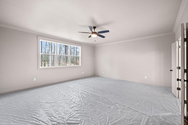 3390 Hillshire Dr, Cumming, GA 30028 - carpeted spare room featuring ceiling fan, ornamental molding, and baseboards