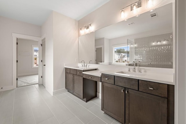 3390 Hillshire Dr, Cumming, GA 30028 - full bath featuring double vanity, healthy amount of natural light, a tile shower, and baseboards