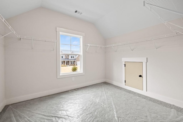 3390 Hillshire Dr, Cumming, GA 30028 - walk in closet featuring vaulted ceiling