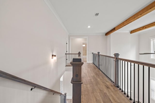 3390 Hillshire Dr, Cumming, GA 30028 - hall featuring wood finished floors, an upstairs landing, recessed lighting, beam ceiling, and crown molding
