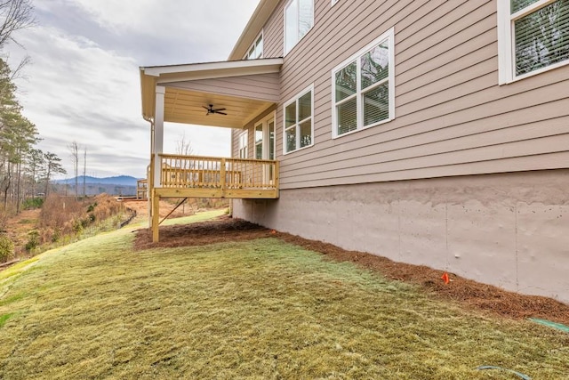 3390 Hillshire Dr, Cumming, GA 30028 - view of grassy yard with a ceiling fan, a mountain view, and a porch