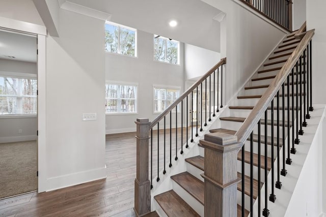 3390 Hillshire Dr, Cumming, GA 30028 - stairs with baseboards, wood finished floors, and recessed lighting
