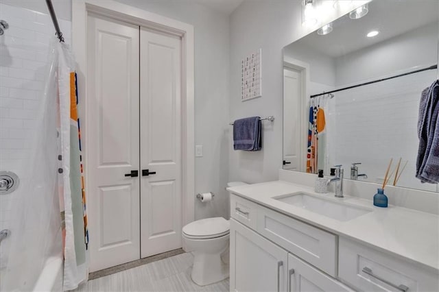 6890 Peachtree Dunwoody Rd Unit 303, Atlanta, GA 30328 - full bathroom featuring vanity, toilet, shower / tub combo, and tile patterned flooring