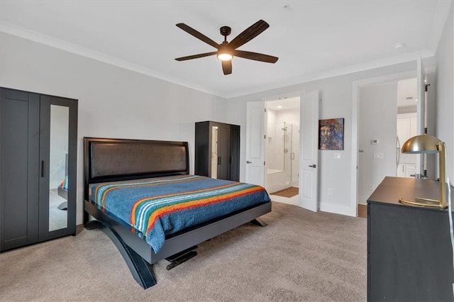 6890 Peachtree Dunwoody Rd Unit 303, Atlanta, GA 30328 - carpeted bedroom featuring crown molding, baseboards, connected bathroom, and ceiling fan