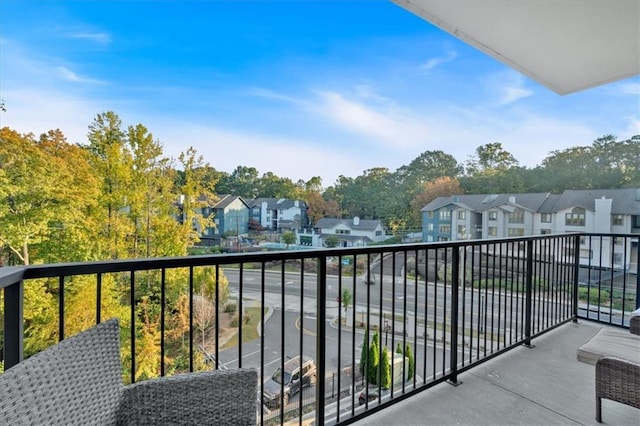 6890 Peachtree Dunwoody Rd Unit 303, Atlanta, GA 30328 - balcony featuring a residential view