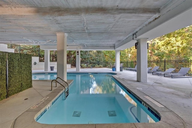 6890 Peachtree Dunwoody Rd Unit 303, Atlanta, GA 30328 - indoor pool with a patio and fence