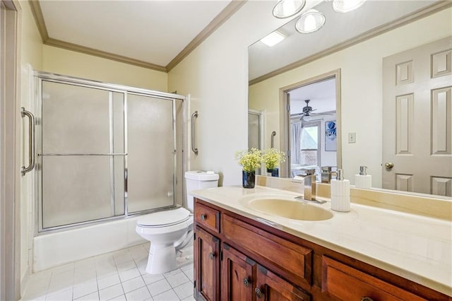 full bathroom with vanity, bath / shower combo with glass door, tile patterned flooring, ceiling fan, and ornamental molding