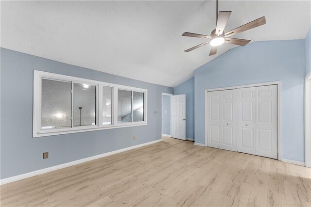 full bathroom with washtub / shower combination, vanity, toilet, and a textured ceiling