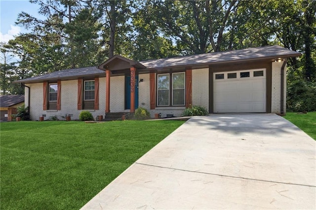 single story home with a garage and a front yard