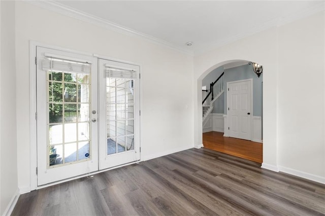 3362 Palm Cir NW, Kennesaw, GA 30144 - doorway to outside featuring arched walkways, dark wood finished floors, stairway, ornamental molding, and french doors