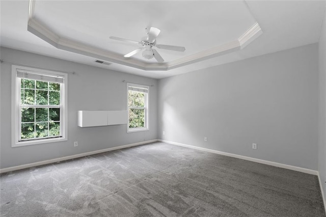 3362 Palm Cir NW, Kennesaw, GA 30144 - empty room featuring a tray ceiling, crown molding, healthy amount of natural light, carpet flooring, and baseboards
