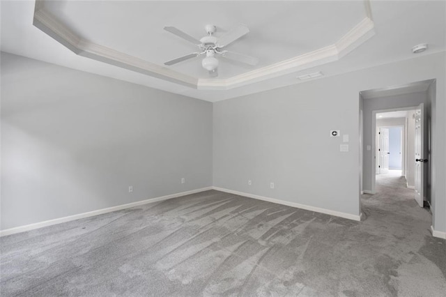 3362 Palm Cir NW, Kennesaw, GA 30144 - carpeted spare room with a tray ceiling, crown molding, ceiling fan, baseboards, and a smoke detector