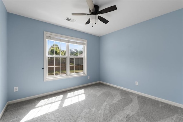 3362 Palm Cir NW, Kennesaw, GA 30144 - carpeted spare room with baseboards and ceiling fan