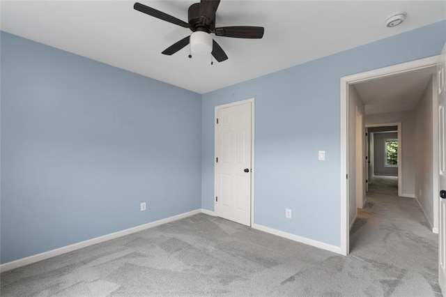 3362 Palm Cir NW, Kennesaw, GA 30144 - unfurnished bedroom featuring carpet floors, baseboards, and ceiling fan