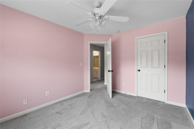 3362 Palm Cir NW, Kennesaw, GA 30144 - unfurnished bedroom with carpet floors, baseboards, and a ceiling fan